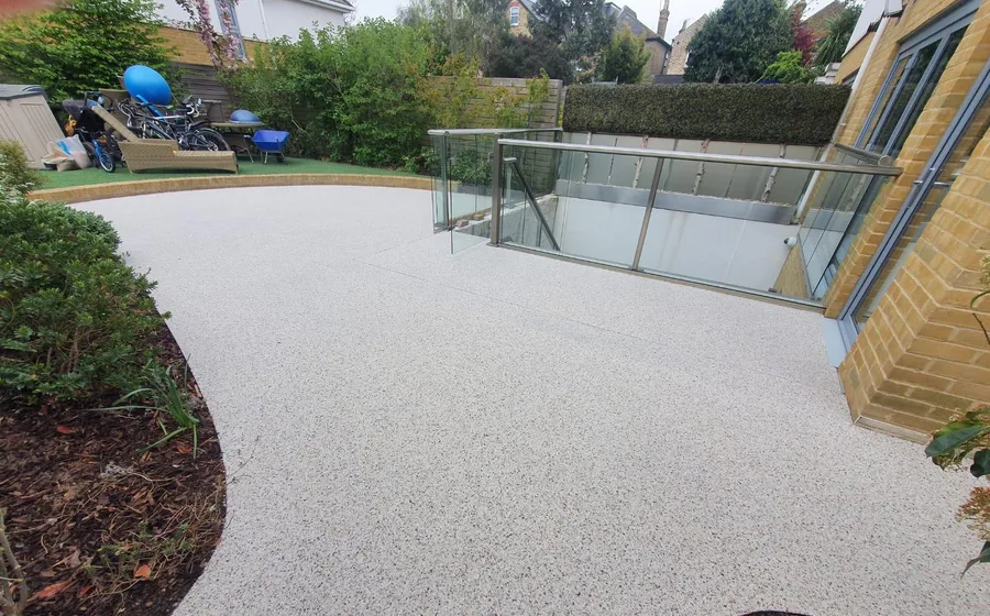 Concrete pathway alongside a home